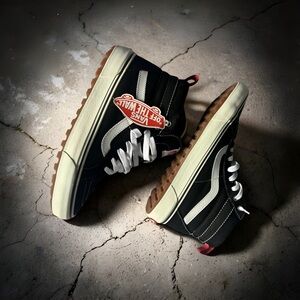 Vans Black and White High-Top Sneakers